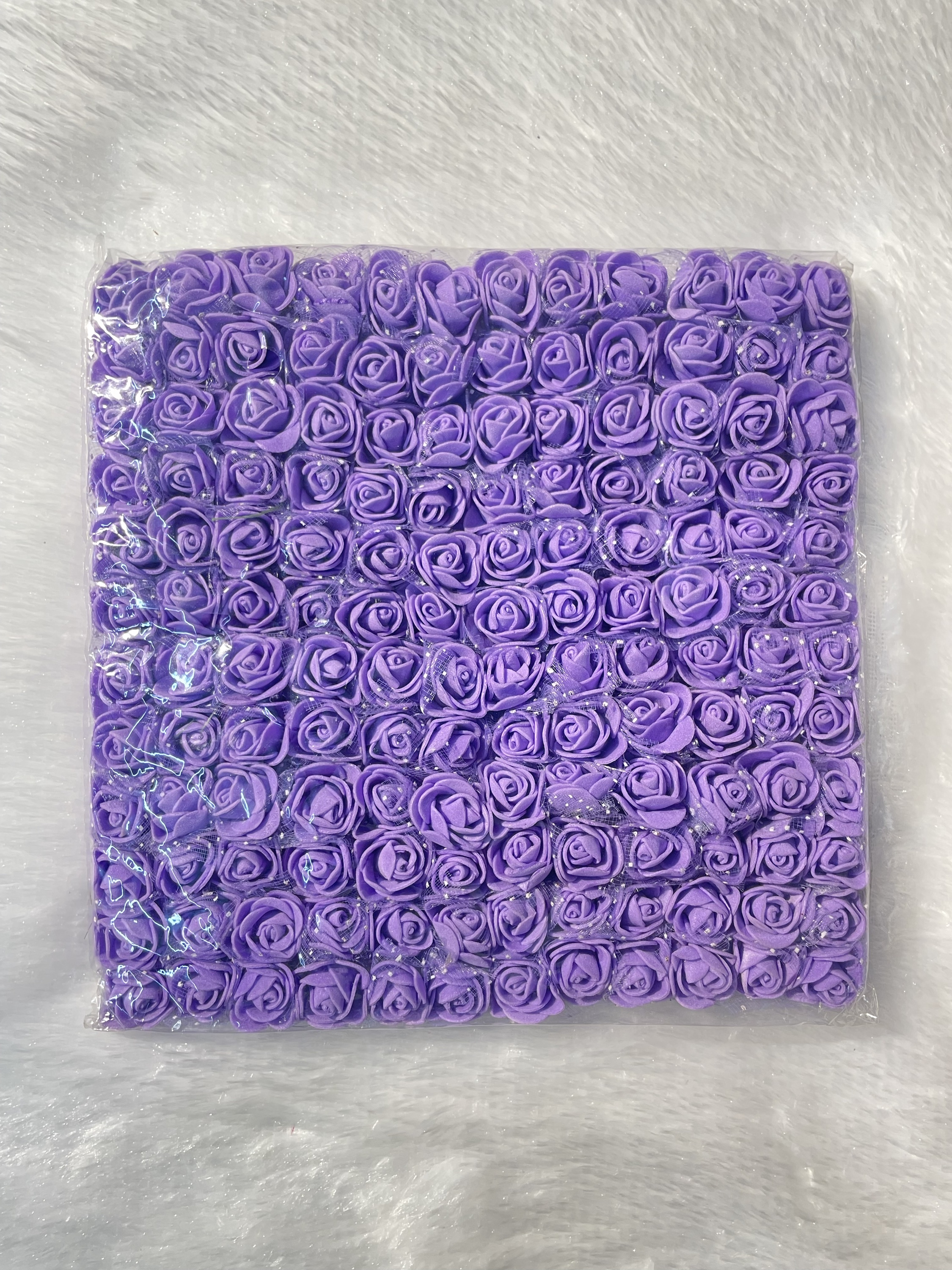 Purple foam flower (144 pieces)

Size-1.5cm